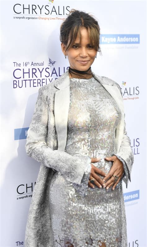 halle berry motions she s pregnant twitter is confused