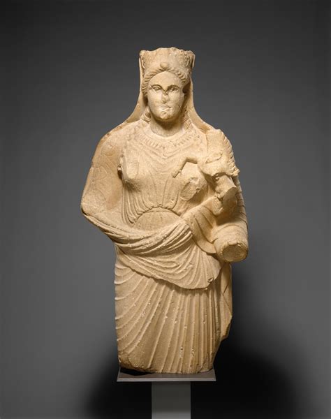 Limestone Statue Of Aphrodite Holding Winged Eros Cypriot Classical