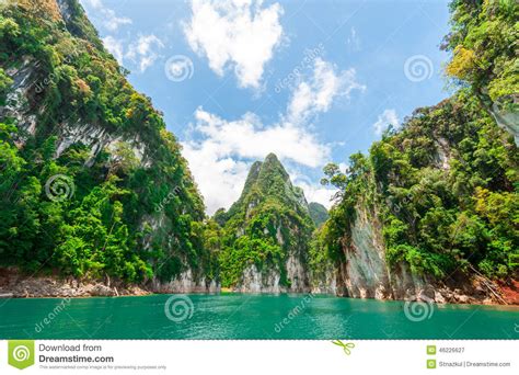 Beautiful Scene Of Blue Green Clear Water With Rock