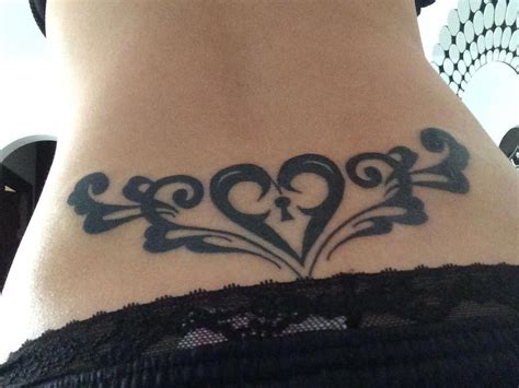 my lower back piece tattoo lowerback heart keyhole swirly lowerbacktattoos lower back