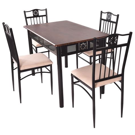 Table and chairs all have metal trimmings and the table is in a round shape. Costway 5 Piece Dining Set Wood Metal Table and 4 Chairs ...