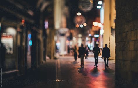 Unfocused People Walking Down The Streets By Stocksy Contributor