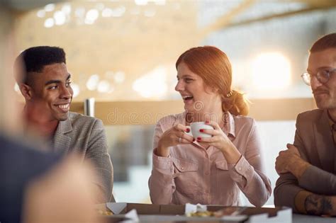 Happy Business People Talking And Laughing Stock Photo Image Of Food