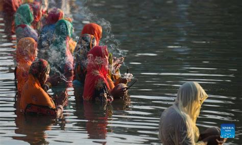 Hindu Devotees Offer Prayers To The Sun On Chhath Puja Festival In