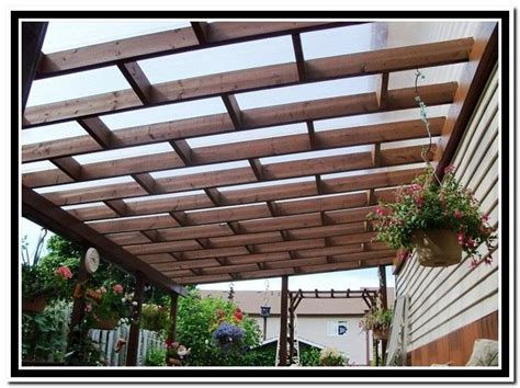 This outdoor kitchen features lots of counter space and a shaded area for dining. Pergola Roof Panels Clear Roof Panels For Pergola Amazing ...
