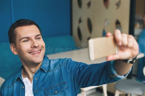 Cheerful Guy Is Photographing Himself On Telephone Stock Image Image
