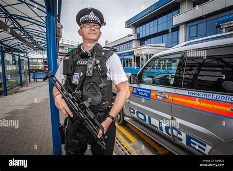 Armed Police Officer On Patrol At London City Airport Stock Photo Alamy