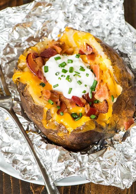 Definitely the best baked potato i've ever had! How to Make Crock Pot Baked Potatoes | Well Plated by Erin