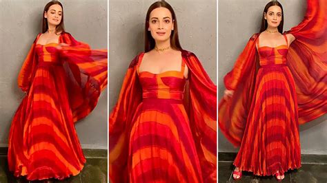 dia mirza is flirty chic in satin chiffon and organza making it a perfect holiday style