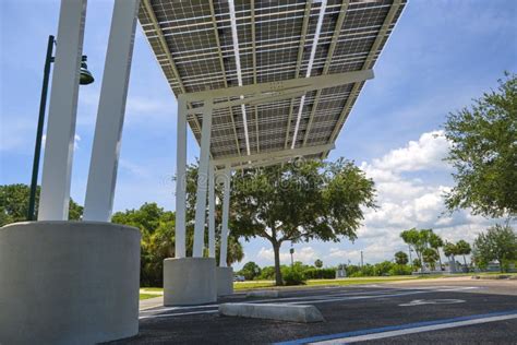 Solar Panels Installed Over Parking Lot Canopy Shade For Parked Cars