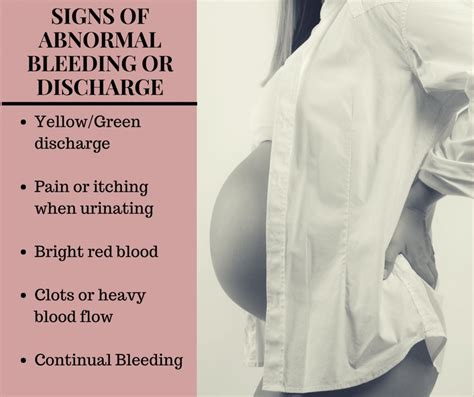 light brown mucus discharge 38 weeks pregnant