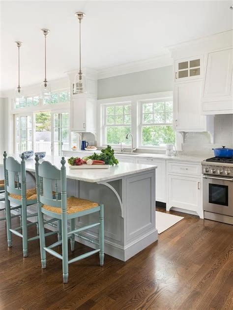 Framed side and back panels; 15 Gorgeous White Kitchens with Coloured Islands - The Happy Housie