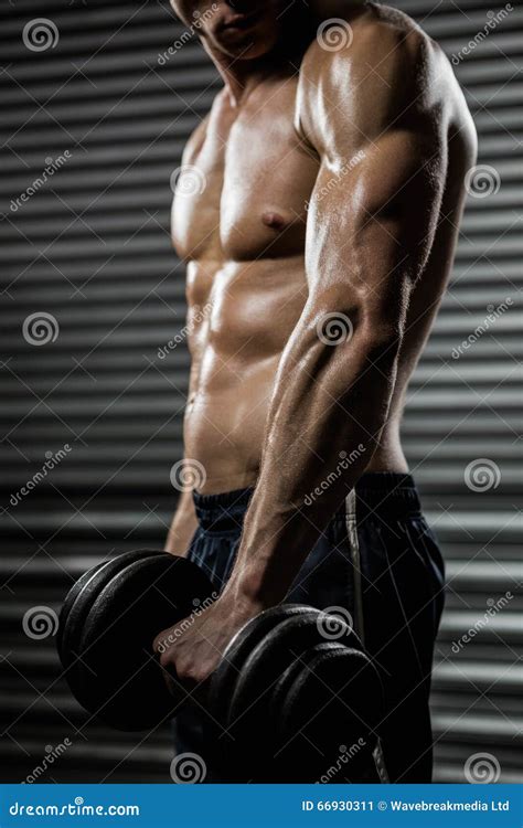 Mid Section Of Shirtless Man Lifting Heavy Dumbbell Stock Image Image
