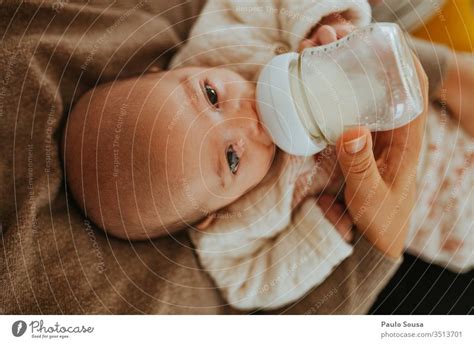 Mother Bottle Feeding Baby A Royalty Free Stock Photo From Photocase