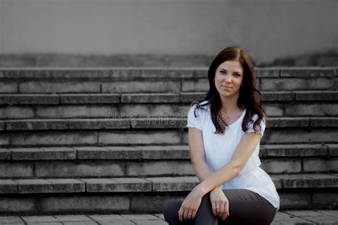 Portrait Of A Beautiful Brunette In A Park In Spring Stock Image