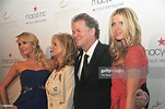 American hotelier Richard Hilton poses with his wife, Kathy , and ...