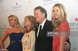 American hotelier Richard Hilton poses with his wife, Kathy , and ...