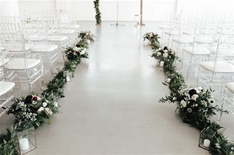 Aisle Greenery And Candle Light For Wedding Ceremony By La Rue Floral