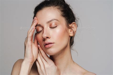 Beautiful Half Naked Woman Posing With Eyes Closed Stock Photo By Vadymvdrobot