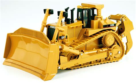 The task was to bring the older caterpillar d11 dozer up from an earlier spec with its unregulated cat 3508 engine to tier ii emissions. www.scalemodels.de | CAT dozer D11R | purchase online