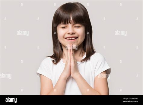 Cute Little Girl Keep Hands In Prayer Praying To God Stock Photo Alamy