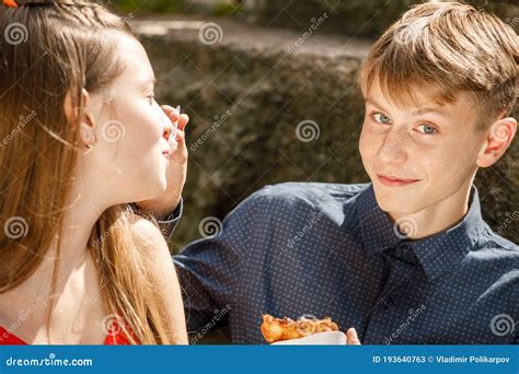 Young Couple On A Romantic Date The Guy Feeds The Girl With A Spoon Stock Image Image Of