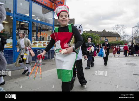 Jewish Children Celebrating Purim In Fancy Dress Take To The Streets