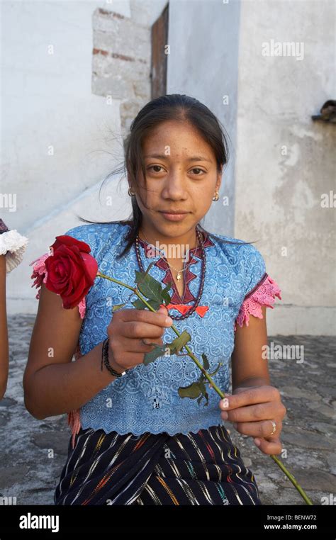guatemala mayan girl holding a red rose san andres el quiche photograph by sean sprague stock