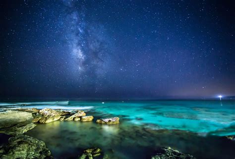 Sea Rocks Night Sky Stars The Milky Way Wallpaper