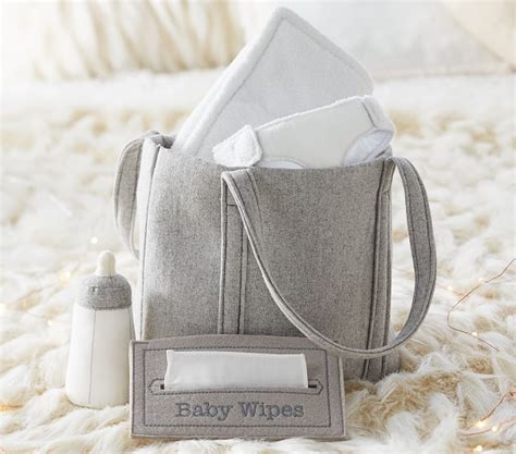 For starters, pottery barn kids offers more custom items than you could even think of to personalize with baby's name or monogrammed initials, including bedding, diaper bags and furniture to name a few. Baby Doll Diaper Bag | Pottery Barn Kids