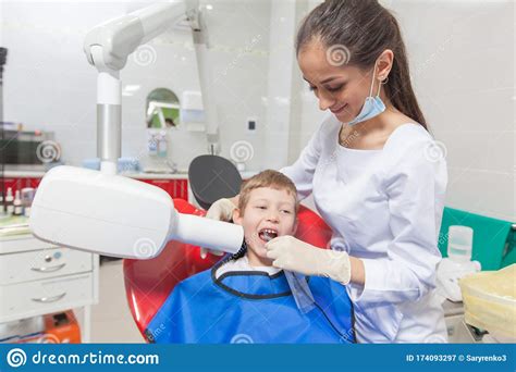 Dentist X Ray A Child With A Dentist In A Dental Office Stock Image