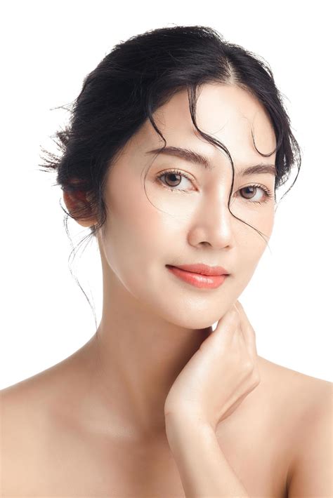 Asian Woman With A Beautiful Face And Perfect Clean Fresh Skin Cute Female Model With Natural