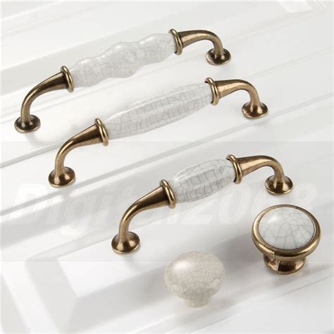 These types of cabinet handles can be had in a variety of lengths these are generally just what the name says: Ceramic Kitchen Cabinet Handles Drawer Pull Knobs Antique ...