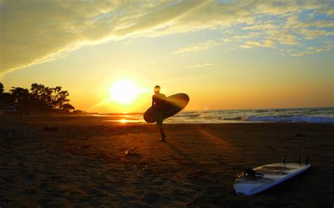 Surfing Board Beaches Sunset Ocean Wallpaper 1920x1200 29144
