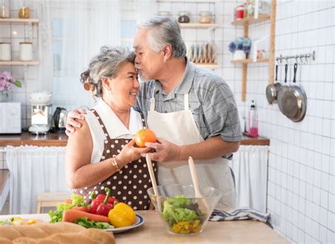 Visitors to this page also searched for: Senior couple having fun in kitchen with healthy food - retired people cooking meal at home with ...