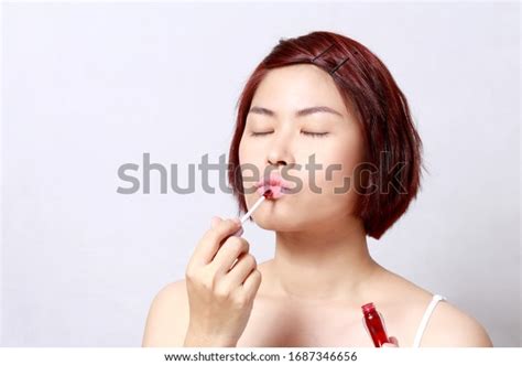 Asian Womans Portrait On White Background Stock Photo