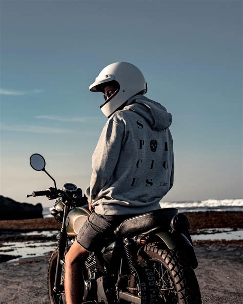 Person Wearing White Helmet Riding On Motorcycle · Free Stock Photo
