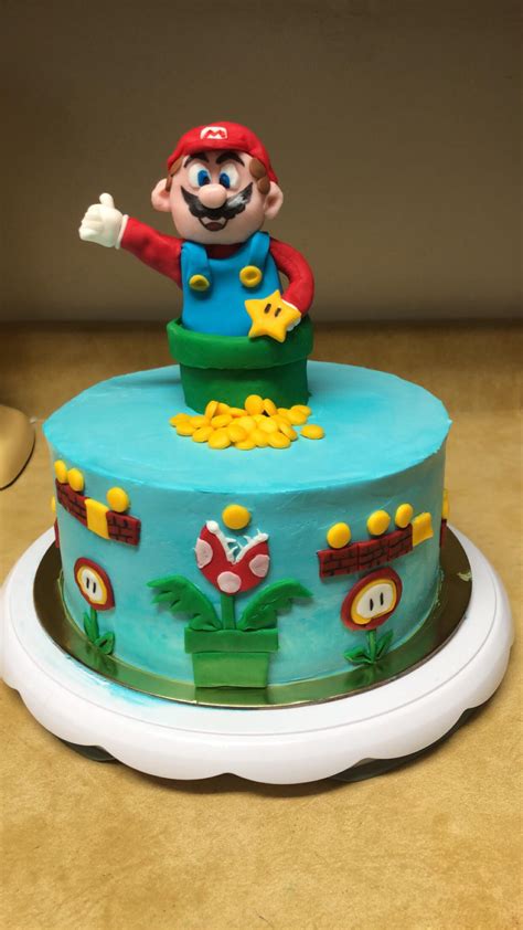 The mario wedding cake with peach and mario on top. Super Mario cake for a sweet boys birthday! Everything is ...