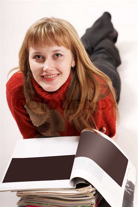 An Image Of A Girl Reading Magazines Stock Image Colourbox