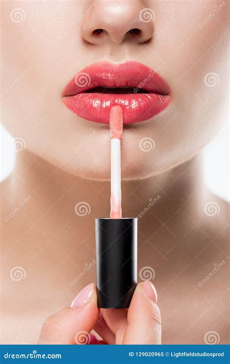 Cropped View Of Woman Applying Pink Lip Gloss Stock Image Image Of