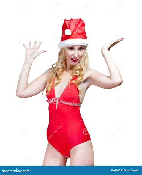 The Beautiful Woman In A Red Bathing Suit And A Red Cap Of Santa Claus