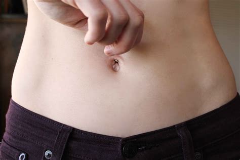 Fashion Style Personal Care Beauty Piercings Tattoos A Navel Piercing Can Be An Eye Catching