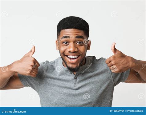 Happy Black Man Showing Thumbs Up At Studio Stock Image Image Of
