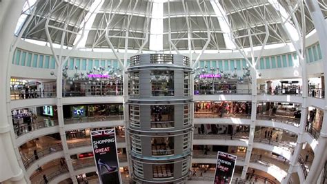 Each mall has a collection of different stores, resulting in a different atmosphere at each. KUALA LUMPUR, MALAYSIA - OCT 28: People Shopping In Suria ...