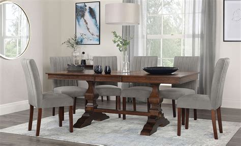 The tables will perfectly fit any party's size. Cavendish Dark Wood Extending Dining Table with 6 ...