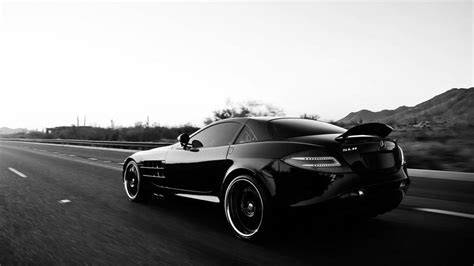 Download 4k Black And White Car On Road Wallpaper