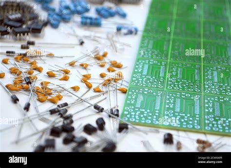Group Of Different Electronic Components Arranged Near Green Electronic