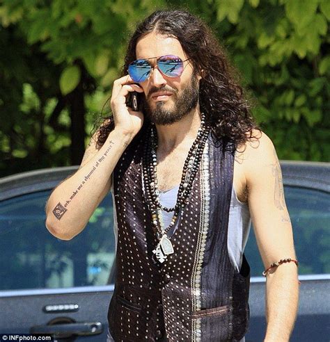 Russell brand is one of the male celebrities who look better with lionger hair. Russell Brand | Russell brand, Long hair beard, Beard tattoo