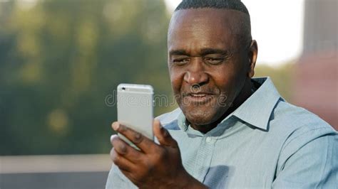 Close Up Senior African American Man Speaking Video Call Chat Looking