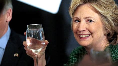 Hillary Clinton Raises Her Glass During A Toast At A Ceremony To Induct